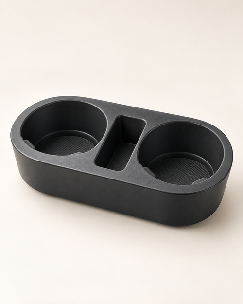 A low-profile dual cup holder organizer with a small center storage pocket.