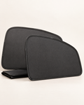 A pair of dark side-window shade panels for compatible parked vehicles.